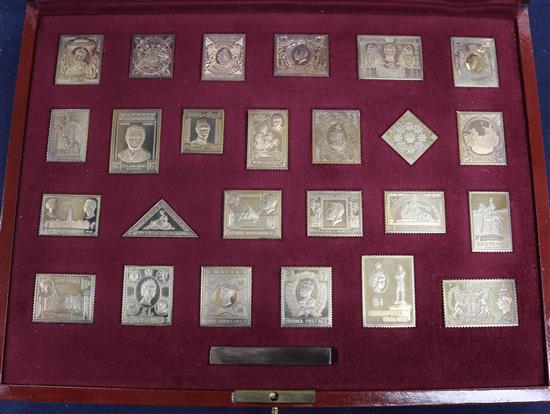 A cased set of twenty four silver gilt stamp replicas, The Empire Collection, London 1981.